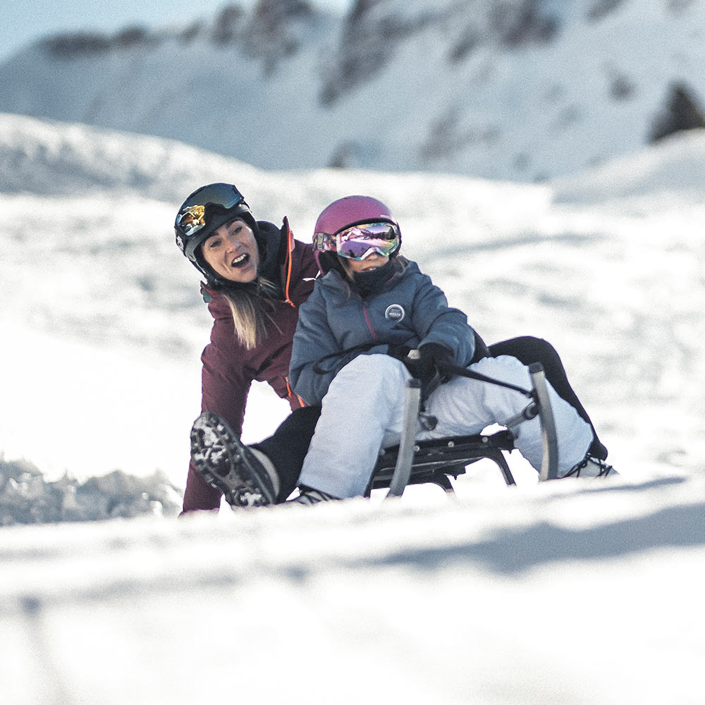 skiing sledding in the dolomites 1